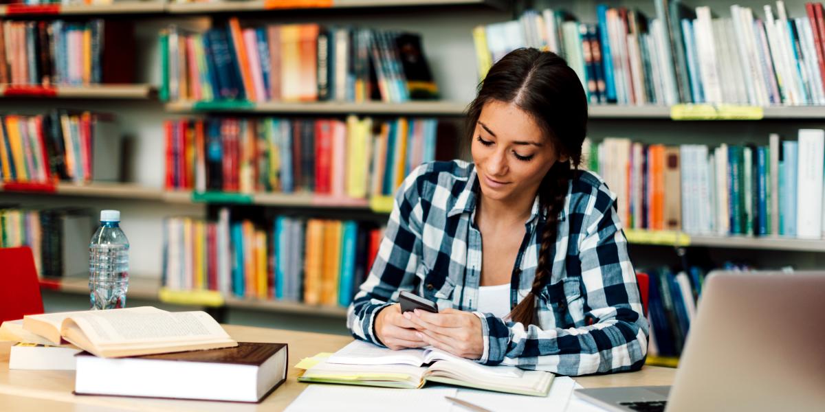 student studying with laptop